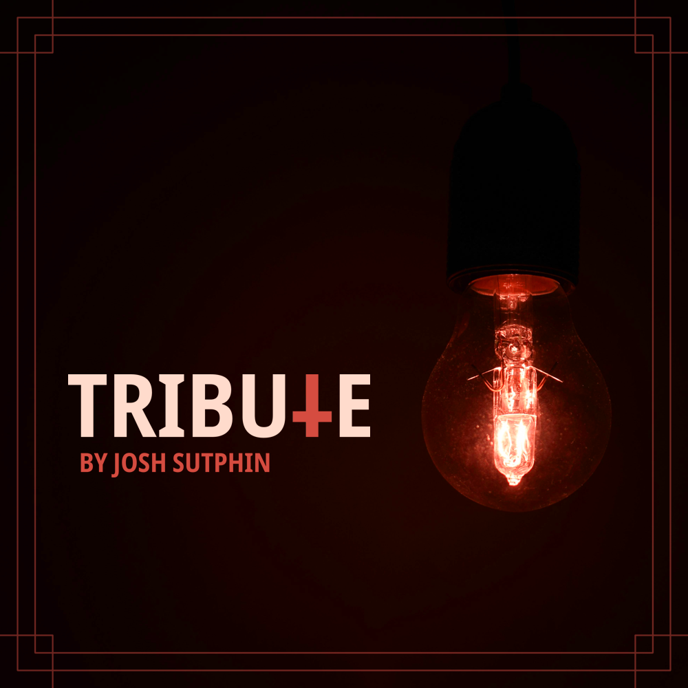 The cover image for TRIBUTE features a red-tinted light bulb and the title, TRIBUTE, in white. The second T in TRIBUTE is a red inverted cross.